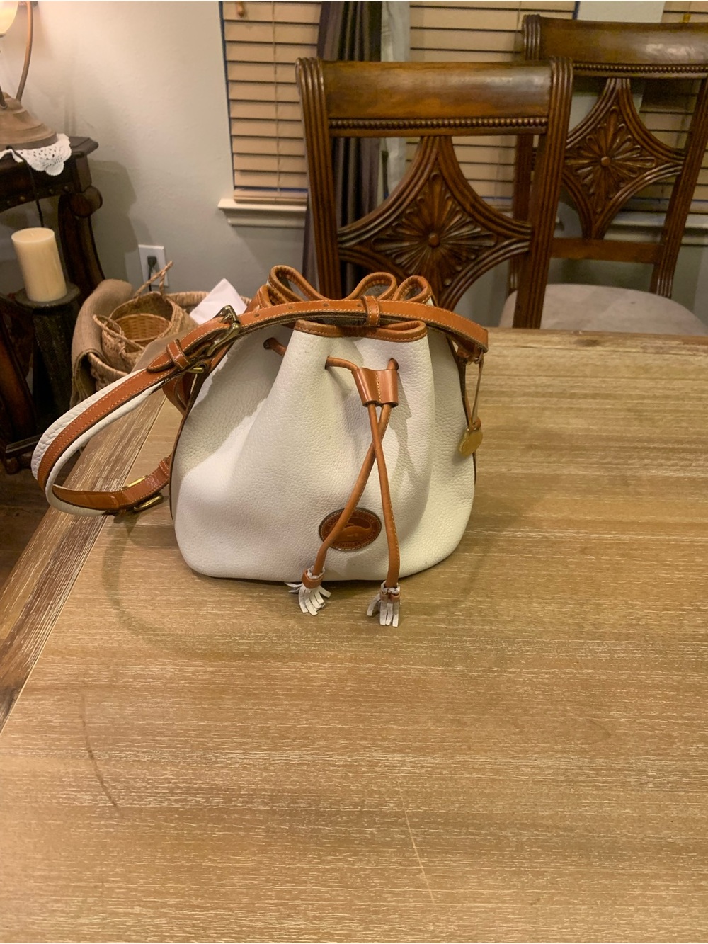 Vintage Dooney & Burke White and Brown Drawstring Bucket Bag with Tassel Accent